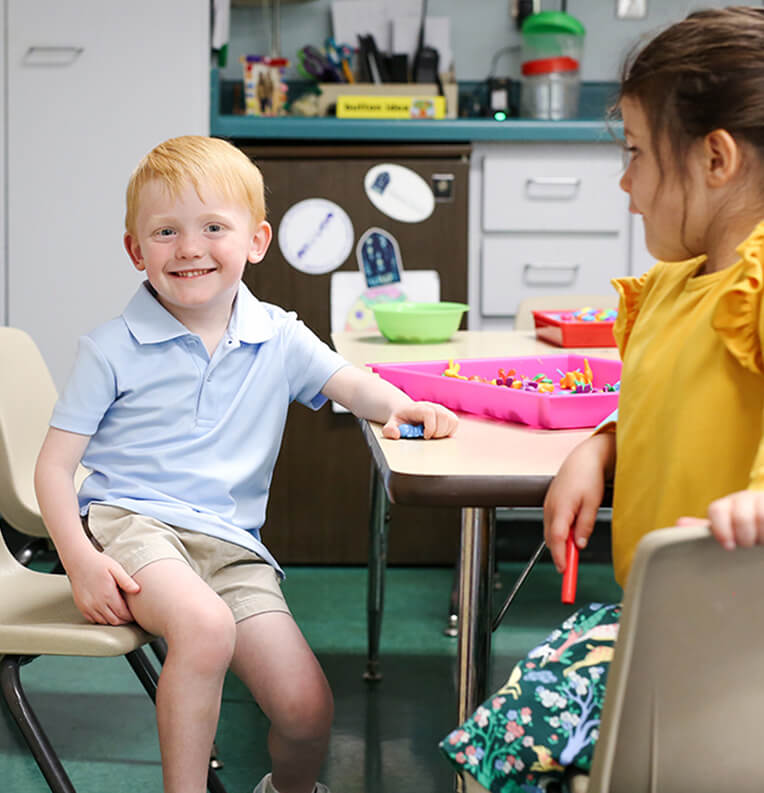 Happy children at table