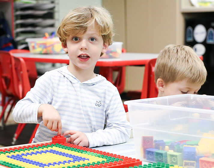 Child with learning toys